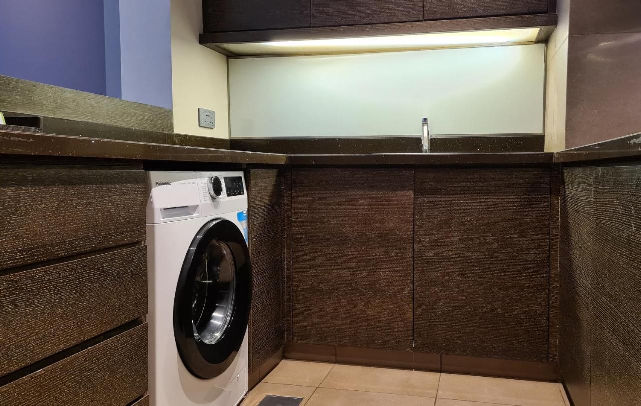 Four Points By Sheraton Al Aïn Extérieur photo A laundry room